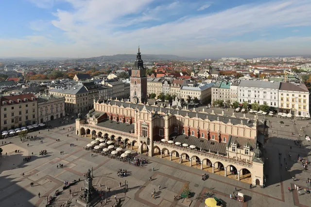 Aerial view of Kraków's Main Market Square with the arcaded Cloth Hall and the old town hall tower