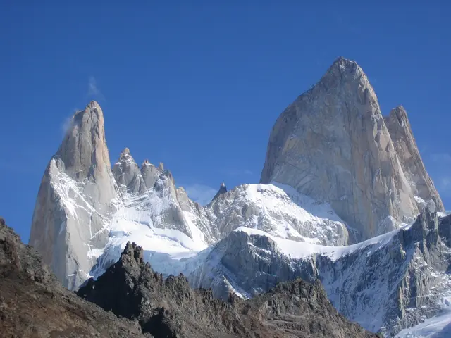 The snow-covered granite spires of Monte Fitz Roy rising above the Patagonian Andes in Argentina