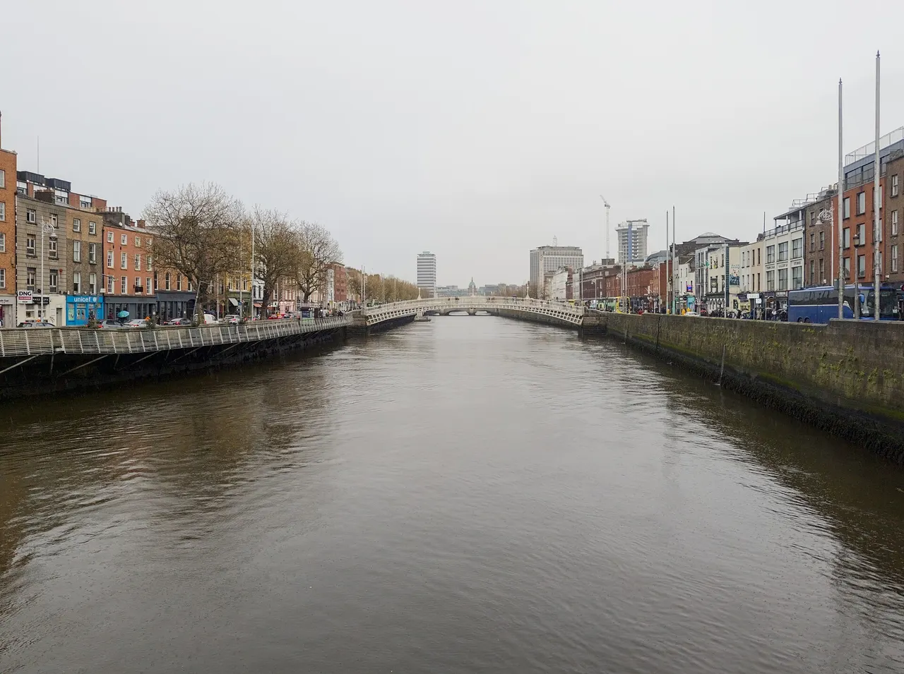 The River Liffey in Dublin seen from O'Connell Bridge, lined with quayside buildings