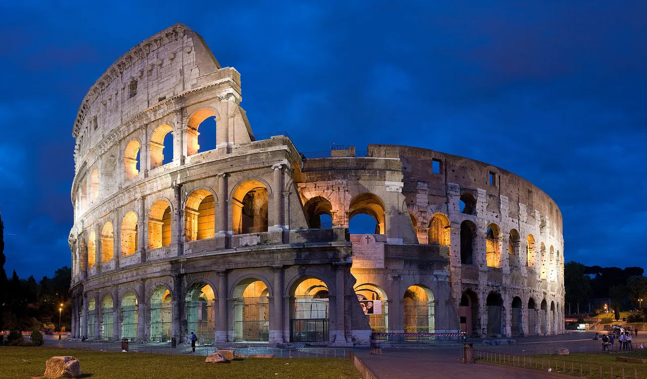 The Colosseum in Rome lit up at dusk